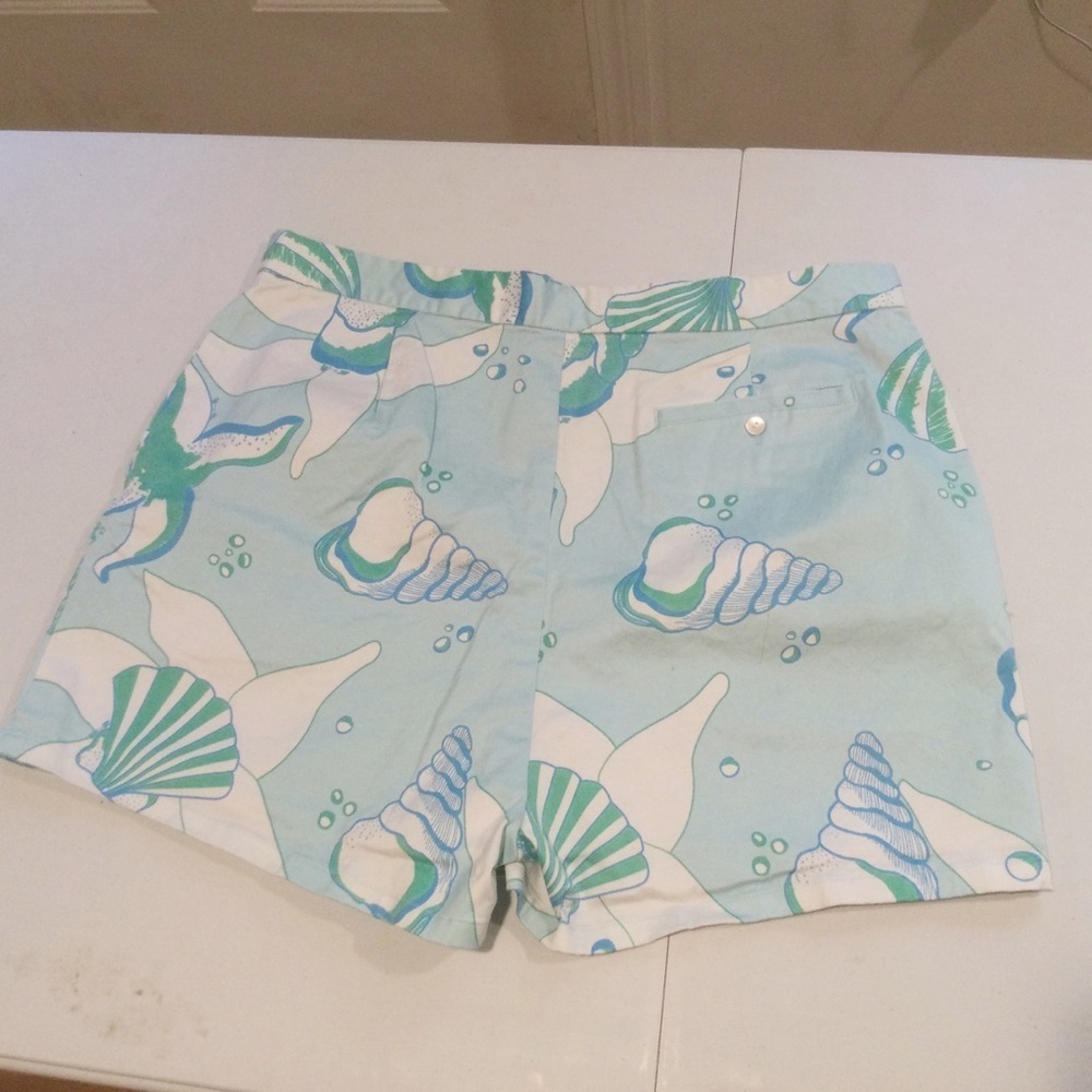 Tibi High waisted blue shell print shorts. Size 12